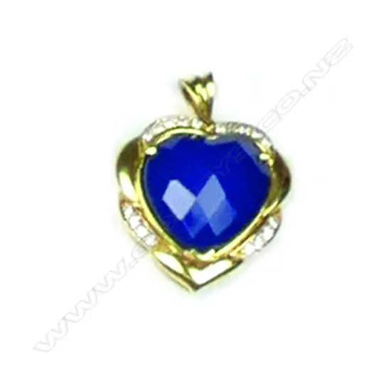 A lady's 18ct. yellow gold dyed blue quartz and diamond set pendant