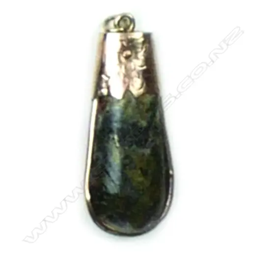 A colonial 9ct. rose gold and gold quartz pendant