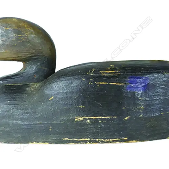 A vintage 14" wide bodied carved wooden duck decoy