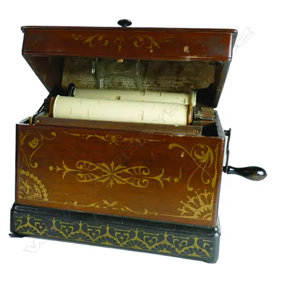 A rare American 'Melodia' portable paper-roll driven organ by the 'Mechanical Orguinette Co.