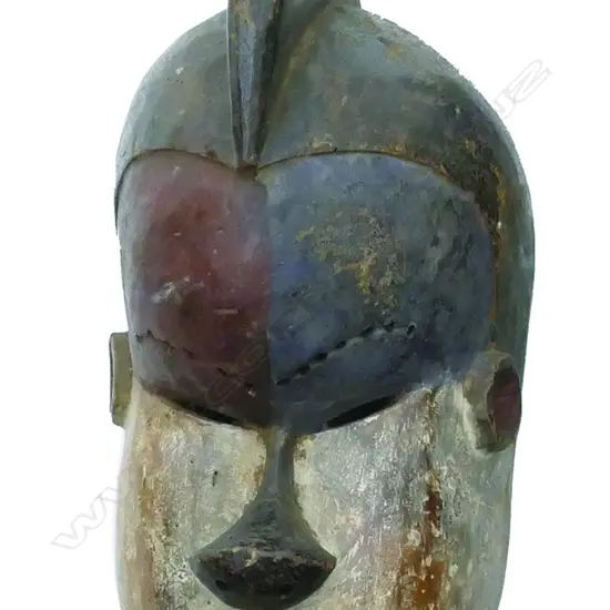 An old African Galoa Gabon wood tribal mask with traces of original coloured pigment