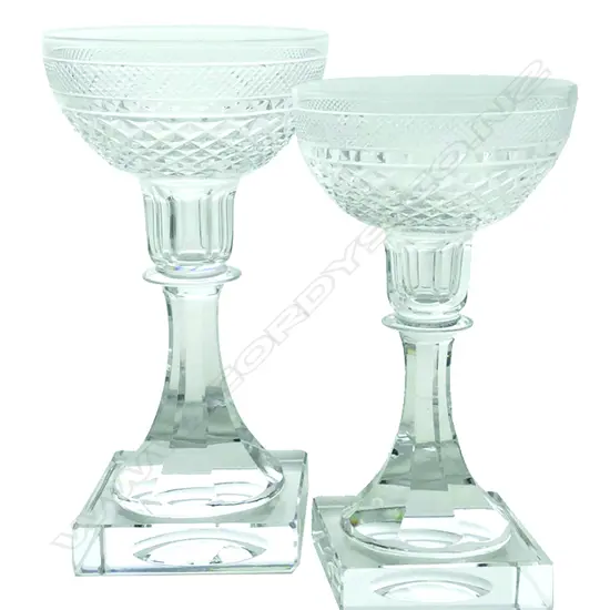 A pair of Kosta Boda cut crystal candlesticks designed by Elis Bergh