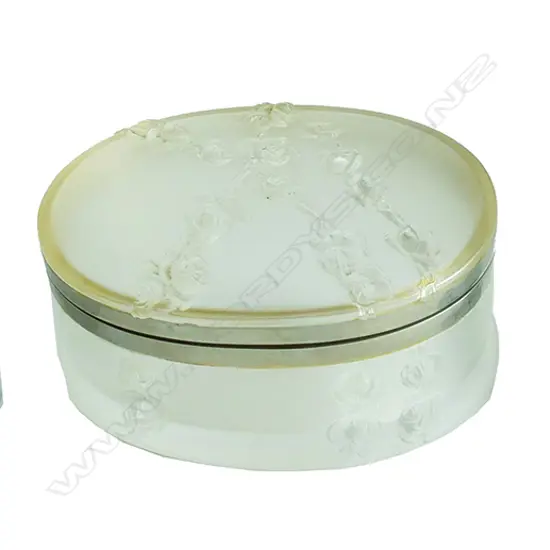 A Lalique frosted glass dressing table box of oval shape