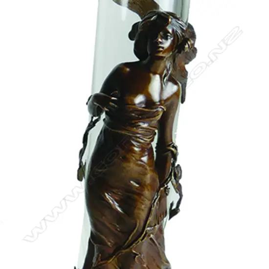 An Art Nouveau style cast bronze and glass vase