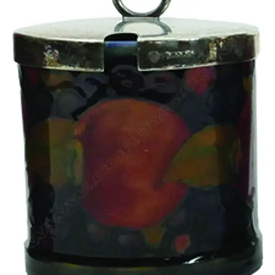 A William Moorcroft pomegranate jam jar with silver plated lid