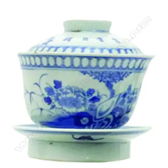 A pair of Chinese blue and white porcelain cups and covers on stands
