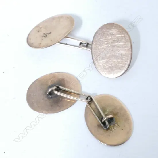 A pair of 9ct. rose gold cufflinks