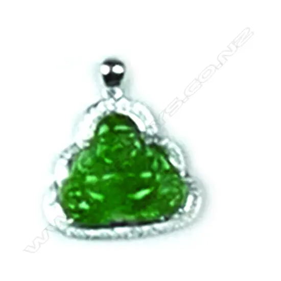 An 18ct. white gold diamond and jade Buddha pendant