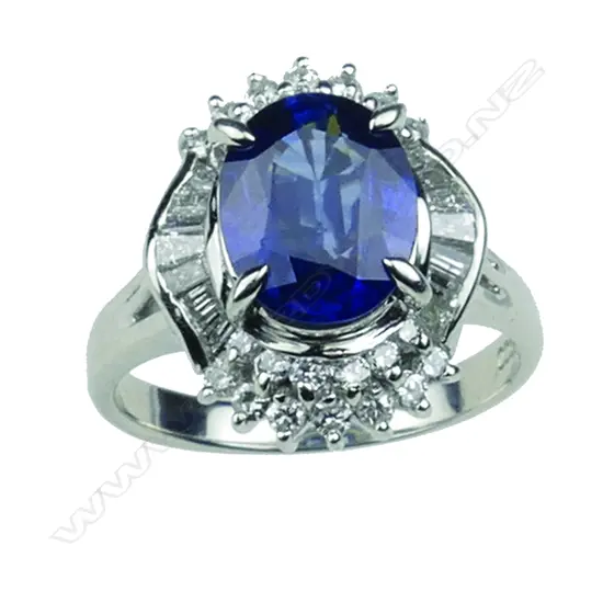 A modern lady's platinum sapphire and diamond cluster ring
