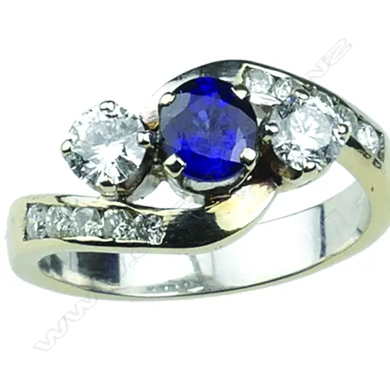An 18ct. white gold sapphire and diamond ring