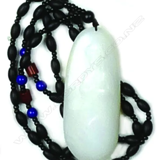 A Chinese Hotan white jade carved pendant