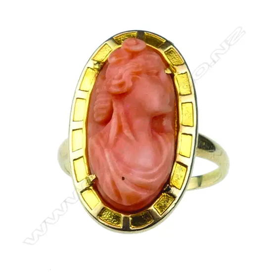 A vintage 10ct. yellow gold and Mediterranean coral carved ring