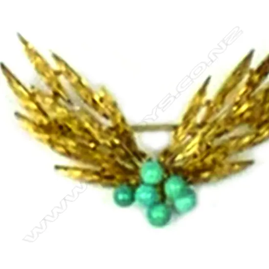 A 14ct. gold and turquoise brooch
