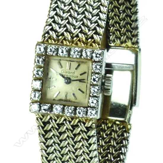 A 18ct. white gold and diamond Girard Perregaux lady's watch