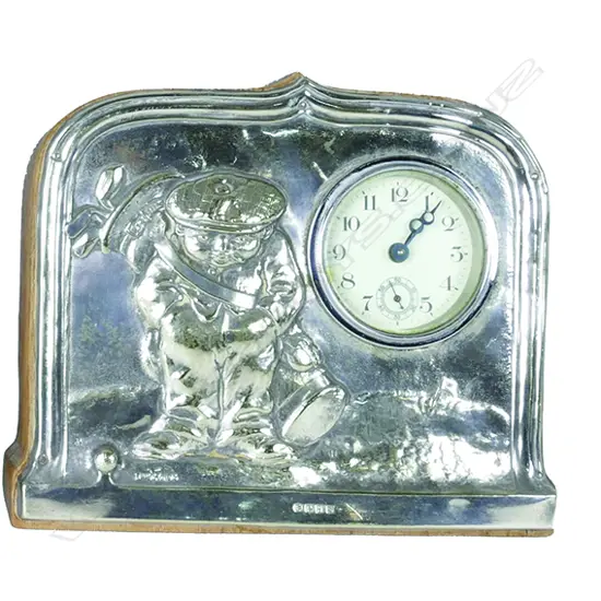 An unusual late-Victorian oak dressing table clock