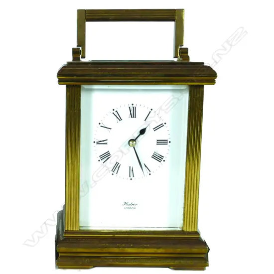 A brass cased carriage clock