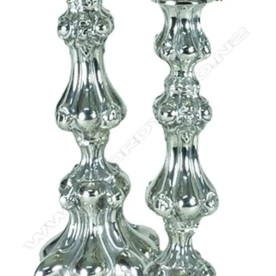 A pair of German silver baroque style candlesticks