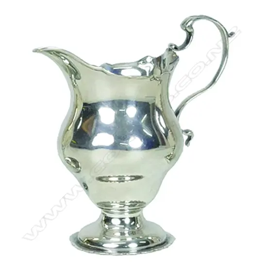 An early 20thC Georgian Revival silver cream jug