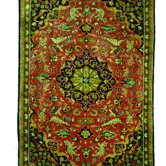 An Iranian Qum silk rug
