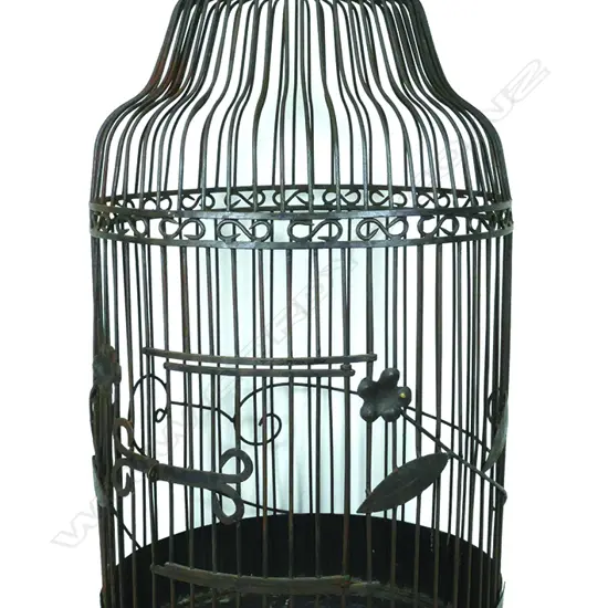A large iron dome top parrot cage