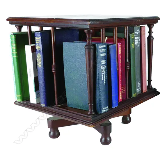 A miniature mahogany revolving bookcase