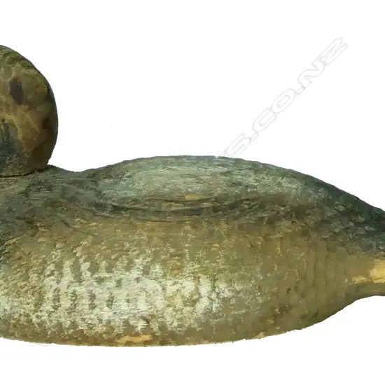 An early 20thC carved and painted wood duck decoy