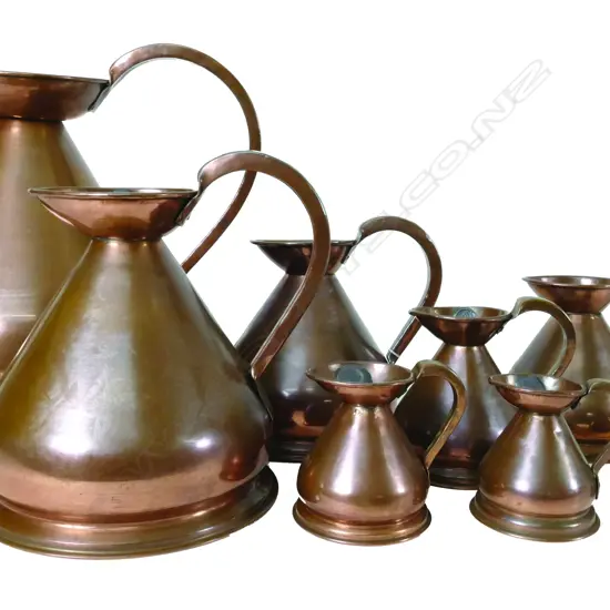 A set of ten 19thC copper measure jugs