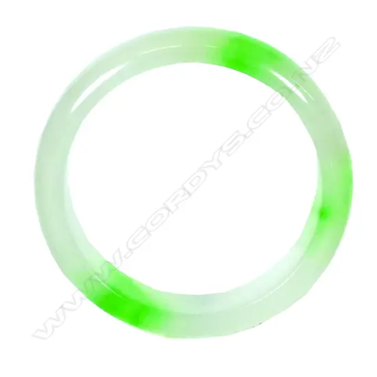 A Chinese mutton fat jade bangle