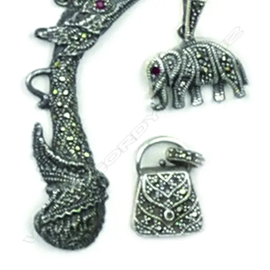 Three vintage silver and marcasite jewellery items