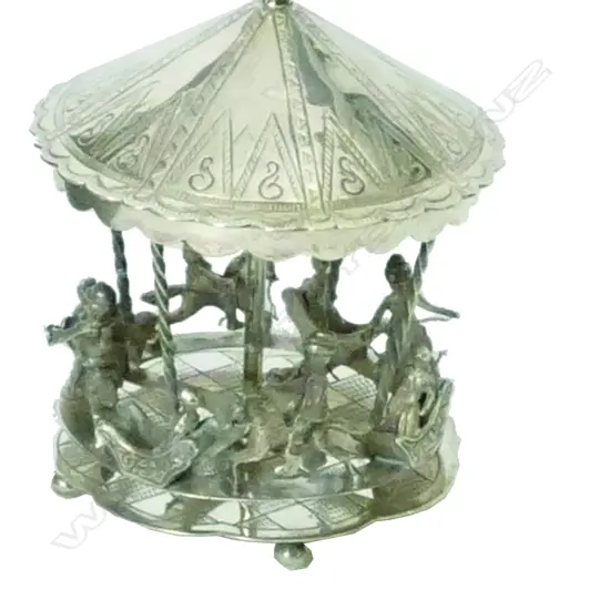 An early 20thC Dutch .835 silver novelty miniature carousel