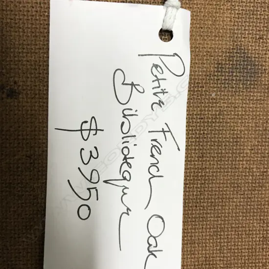 A French oak carved petite bibliotheque