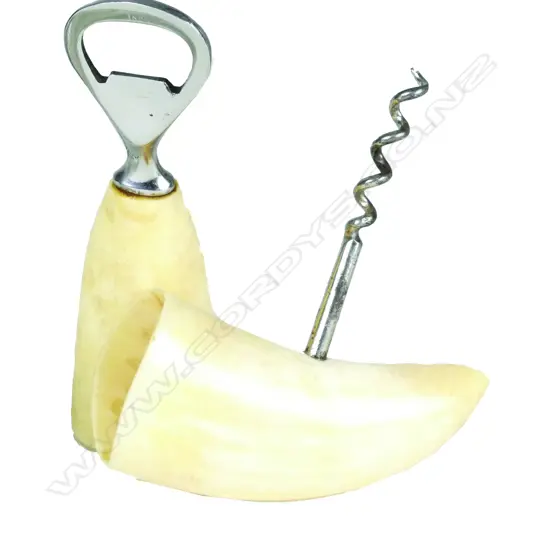 A pair of sperm whale tooth bar implements