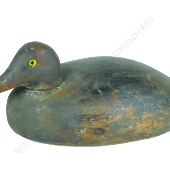 A vintage carved solid wood American Goldeneye 14" duck decoy