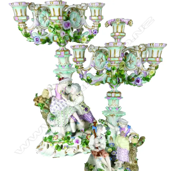 A pair of 19thC German Meissen porcelain six-light five-branch table candelabra