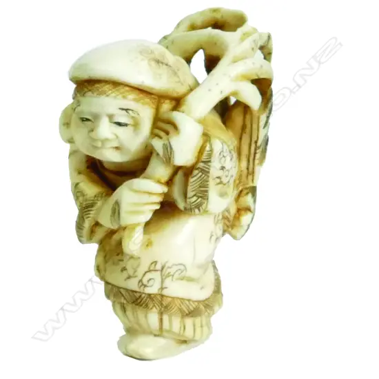 A Meiji period Japanese carved ivory Okimono