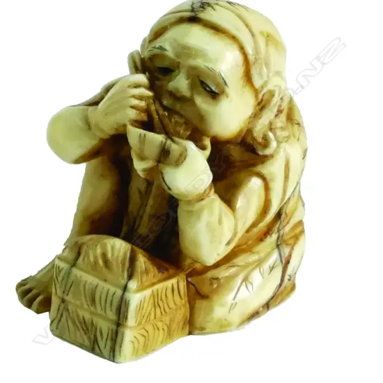 A Meiji period Japanese carved ivory netsuke