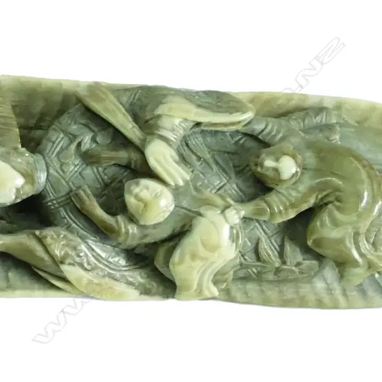 An Oriental carved mammoth tooth goddess figure