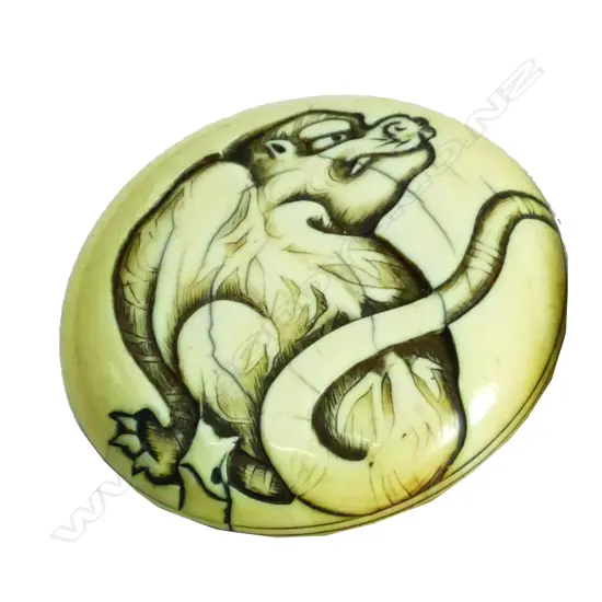 A 19thC Japanese carved ivory Manju netsuke