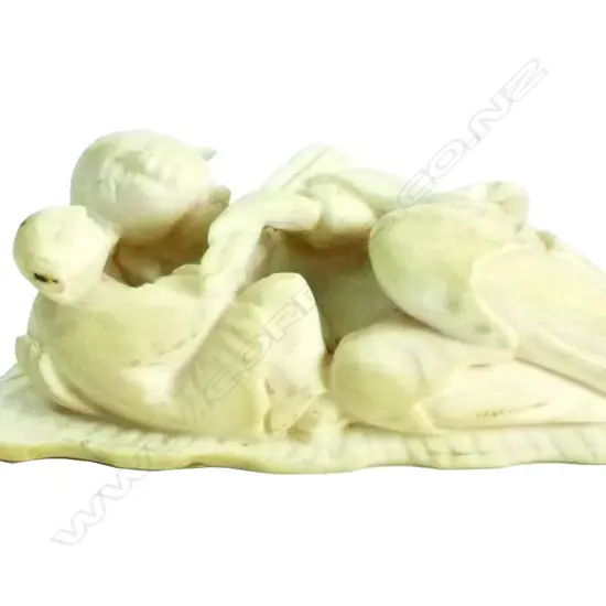 A c.1900 Oriental carved ivory figure group