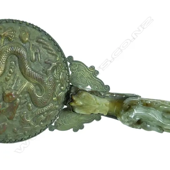 An old Chinese belt buckle handled hand mirror