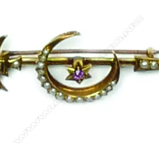 An Edwardian 15ct. yellow gold and seed pearl sword and crescent bar brooch