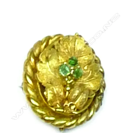 A 19thC gilded 18ct. yellow gold brooch