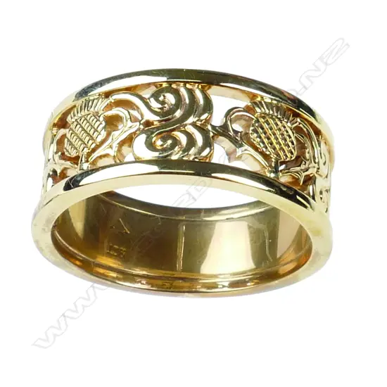 A modern 9ct. yellow gold custom made gent's wedding band