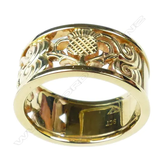 A modern 9ct. yellow gold custom made lady's wedding band
