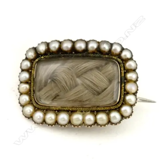 A George III gold and seed pearl mourning brooch