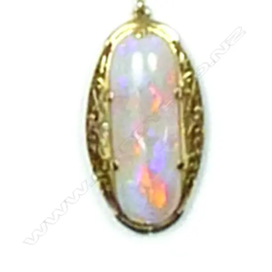 A vintage 18ct. yellow gold handmade opal pendant