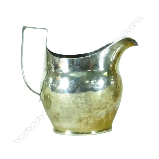 A George III silver flat bottomed helmet cream jug