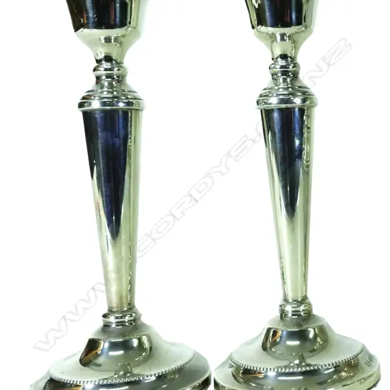 A pair of modern silver candlesticks