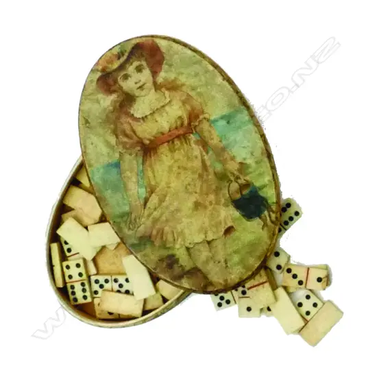 A 19thC small carved bone travelling domino set in decorative 19thC card case