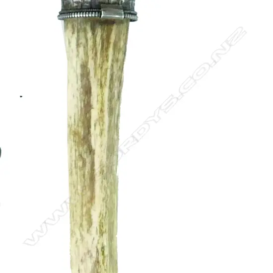 An old bone and silver Tibetan 'kangling' Buddhist trumpet